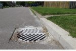 paint_on_storm_drain.jpg