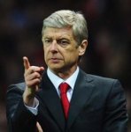 arsene-wenger-point-255x260.jpg