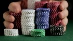 stock-footage-pushing-poker-chips-toward-camera.jpg