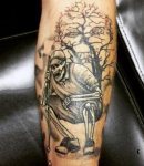mens-forearms-skeletal-golfer-tattoo.jpg