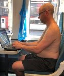 16489370-7284083-A_man_rides_shirtless_on_an_air_conditioned_Great_Northern_train-m-101_156406...jpg
